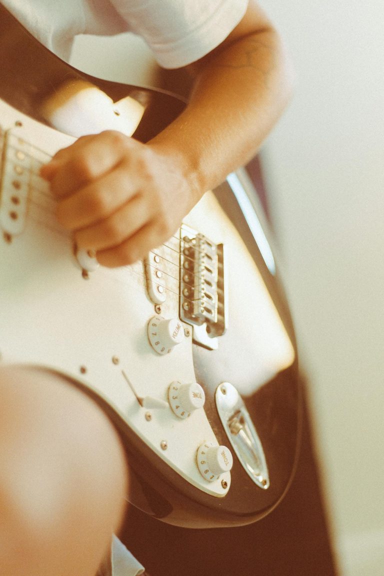 Man Playing Electric Guitar